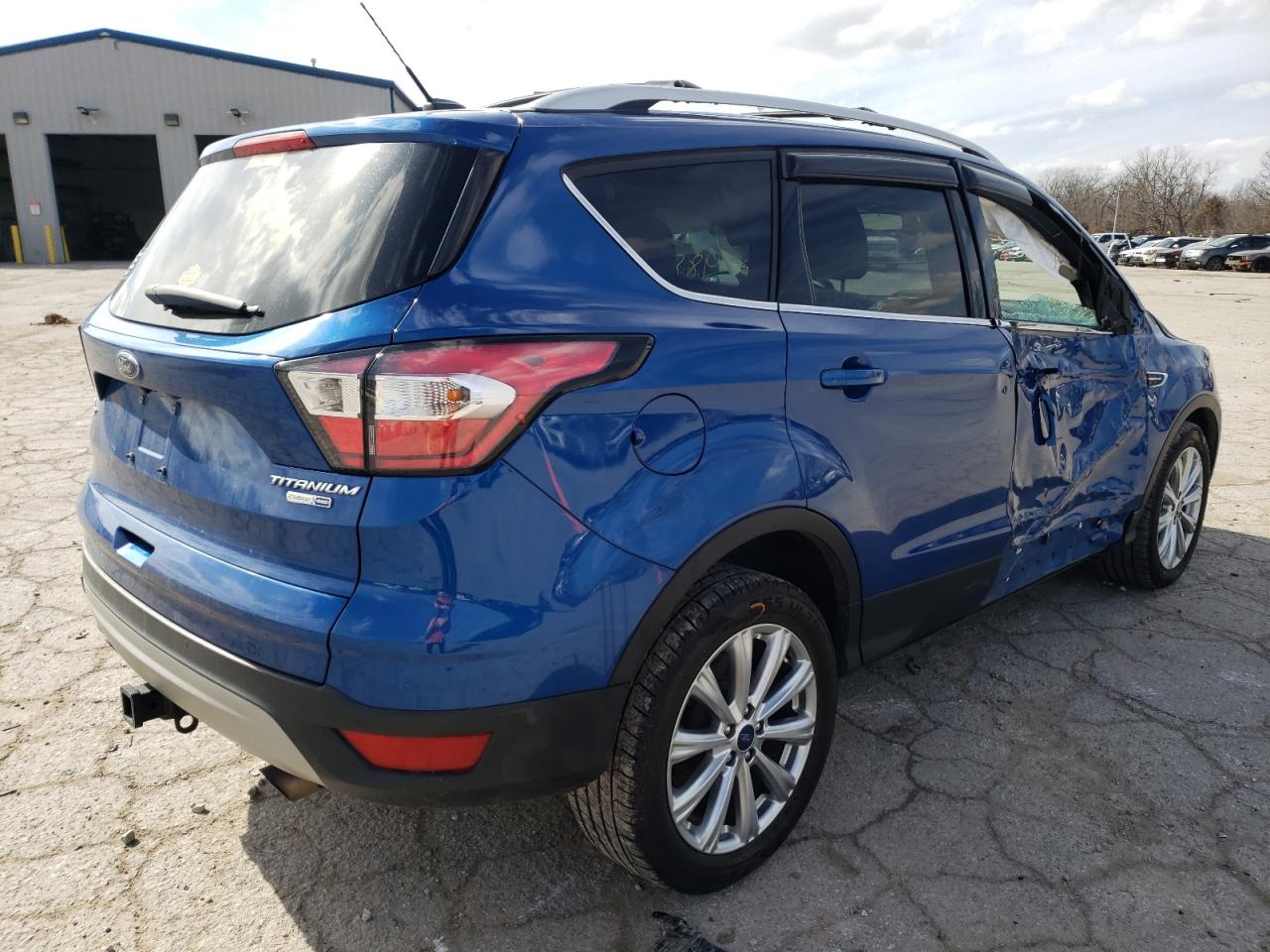 Photo 4 from auction – 2017 FORD ESCAPE TIT with VIN 1FMCU9J90HUC79159