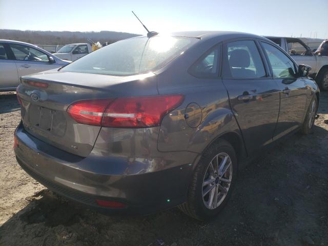 Photo 7 from auction – 2016 FORD FOCUS SE with VIN 1FADP3F29GL232344