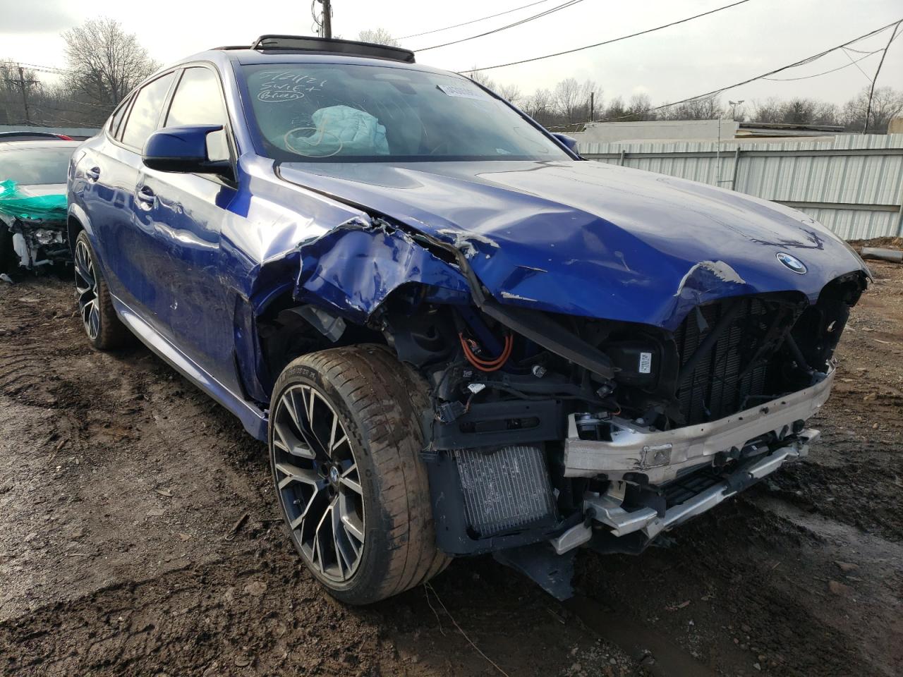 BMW X6 M 2021 with VIN 5YMCY0C00M9E24050 - Photo from auction