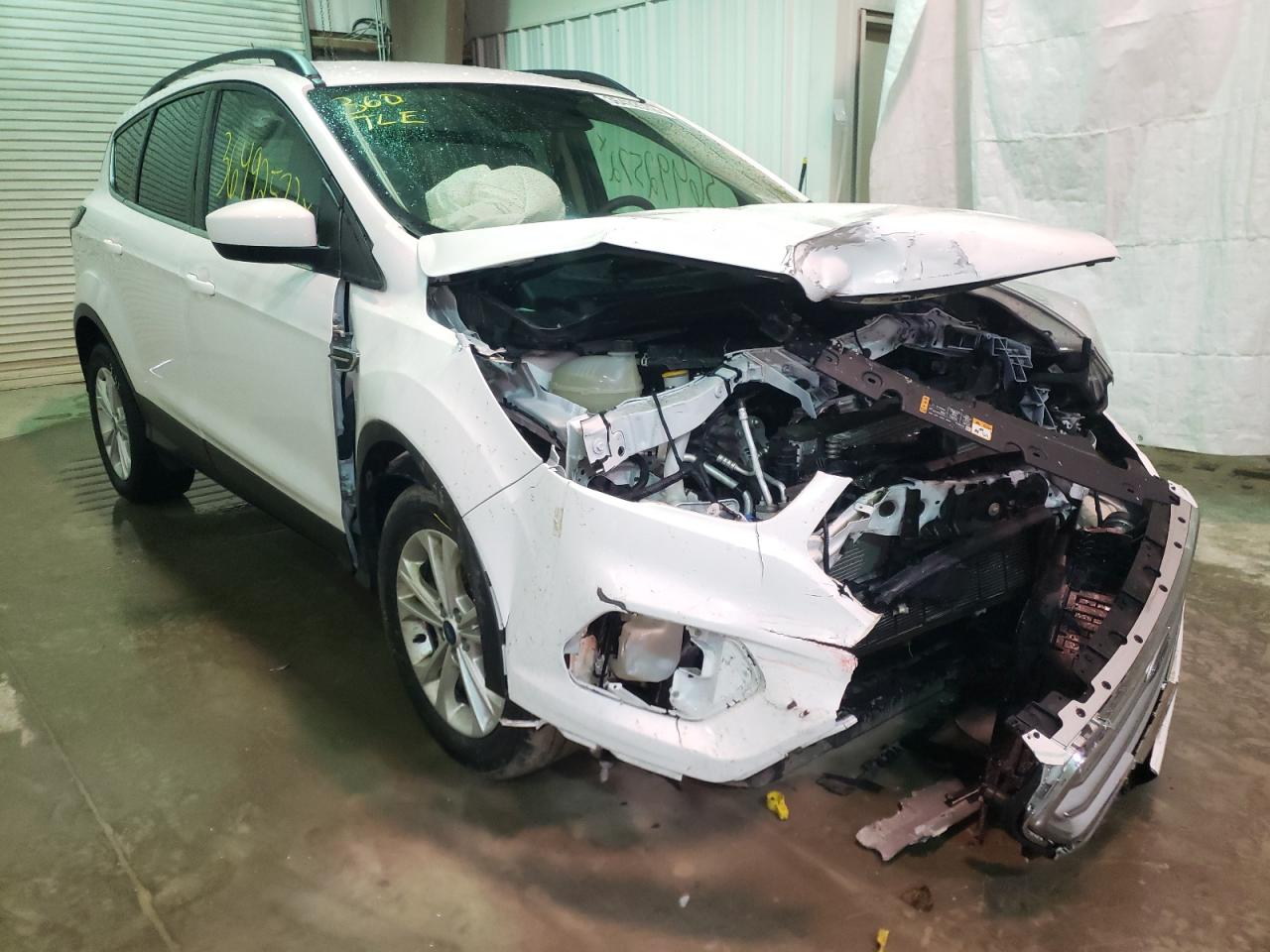 FORD ESCAPE SE 2018 with VIN 1FMCU9GD1JUB53264 - Photo from auction