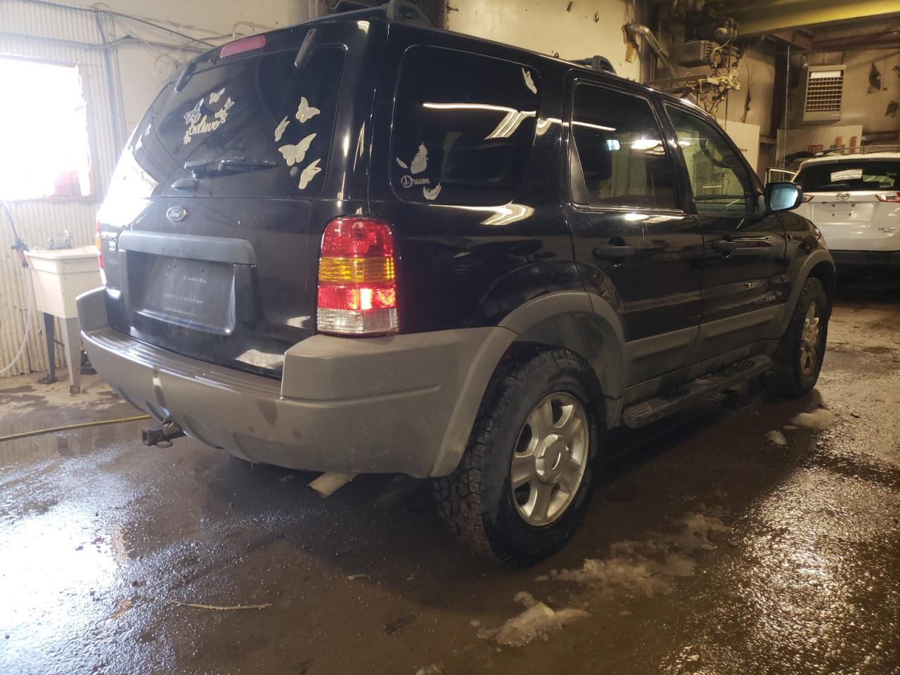 Photo 4 from auction – 2002 FORD ESCAPE XLT with VIN 1FMCU04172KB12866
