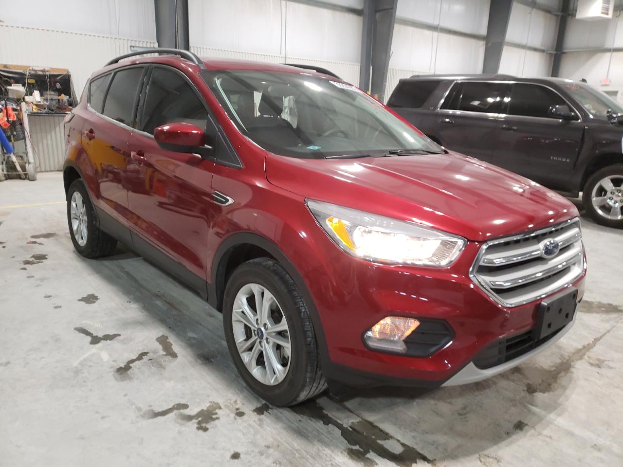 FORD ESCAPE SE 2018 with VIN 1FMCU9GD9JUC34593 - Photo from auction