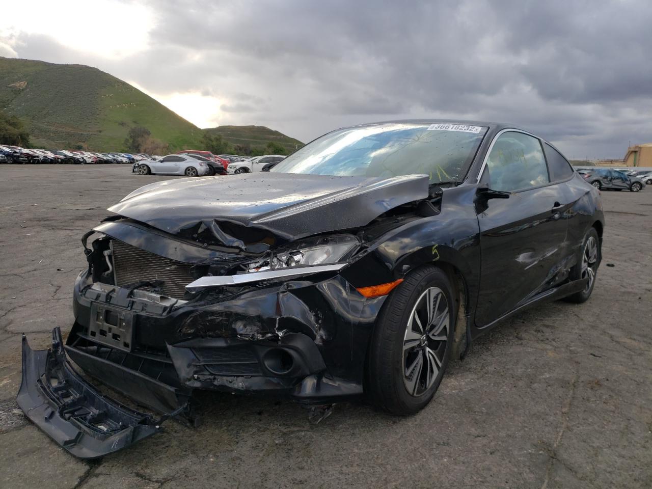 Photo 2 from auction – 2017 HONDA CIVIC EXL with VIN 2HGFC3B79HH360082
