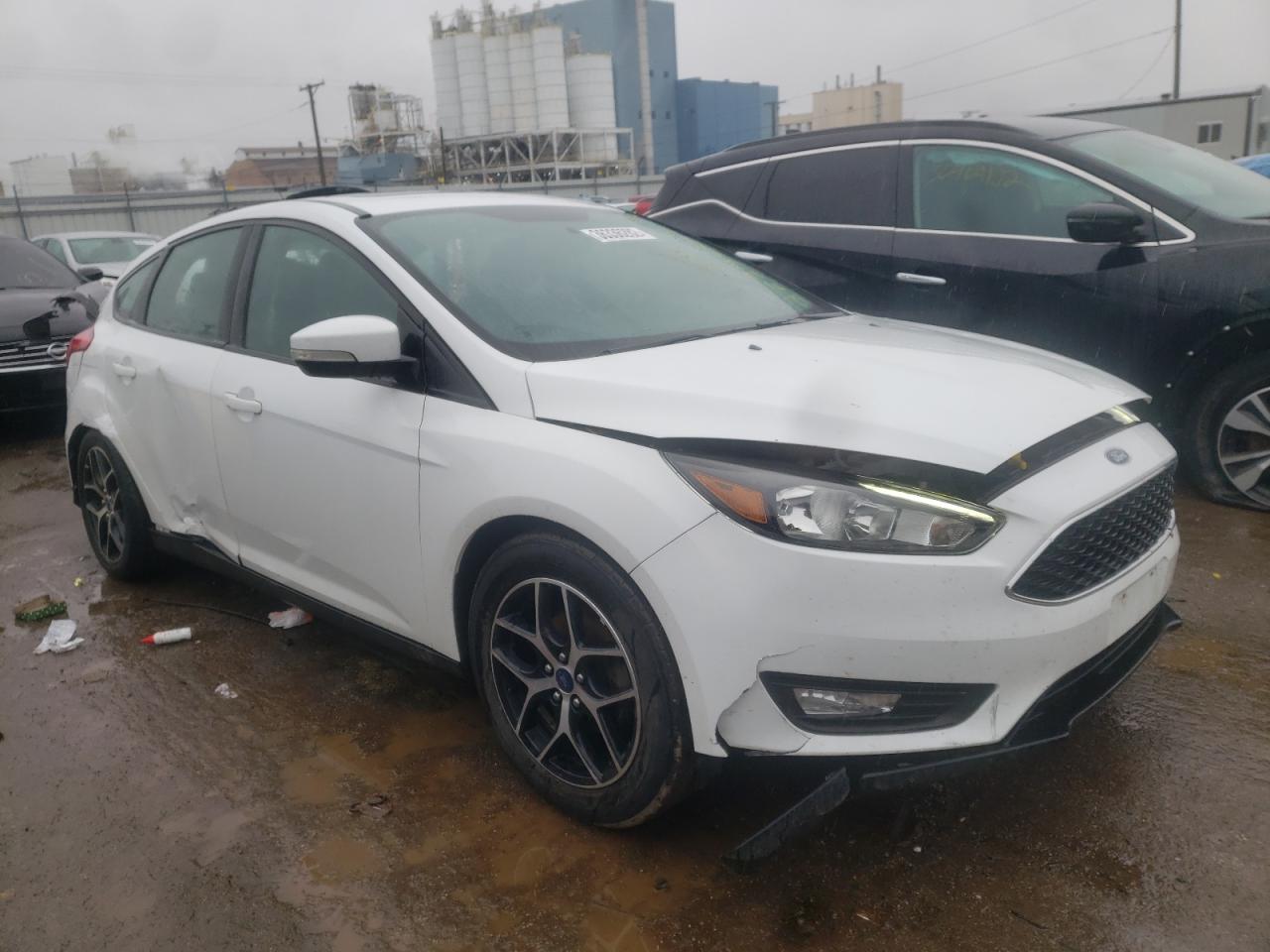 FORD FOCUS SEL 2017 with VIN 1FADP3M2XHL264563 - Photo from auction