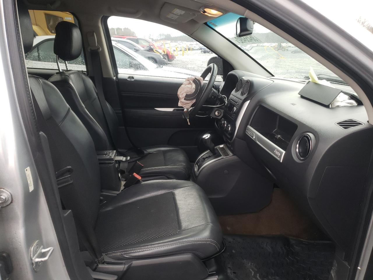 Photo 5 from auction – 2014 JEEP COMPASS LA with VIN 1C4NJCEA1ED522710