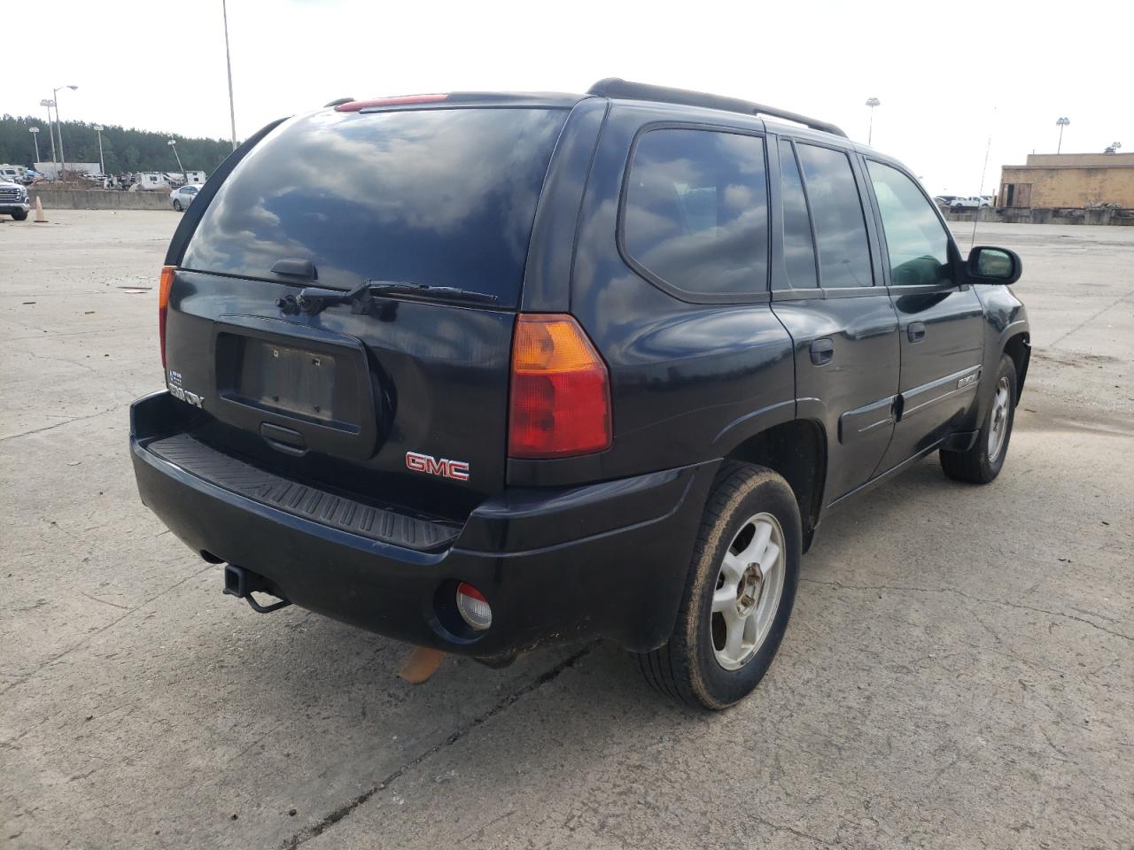 Photo 4 from auction – 2005 GMC ENVOY with VIN 1GKDS13S552114851