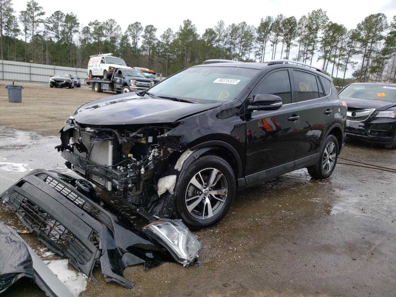 Photo 2 from auction – 2016 TOYOTA RAV4 XLE with VIN 2T3RFREV2GW531060