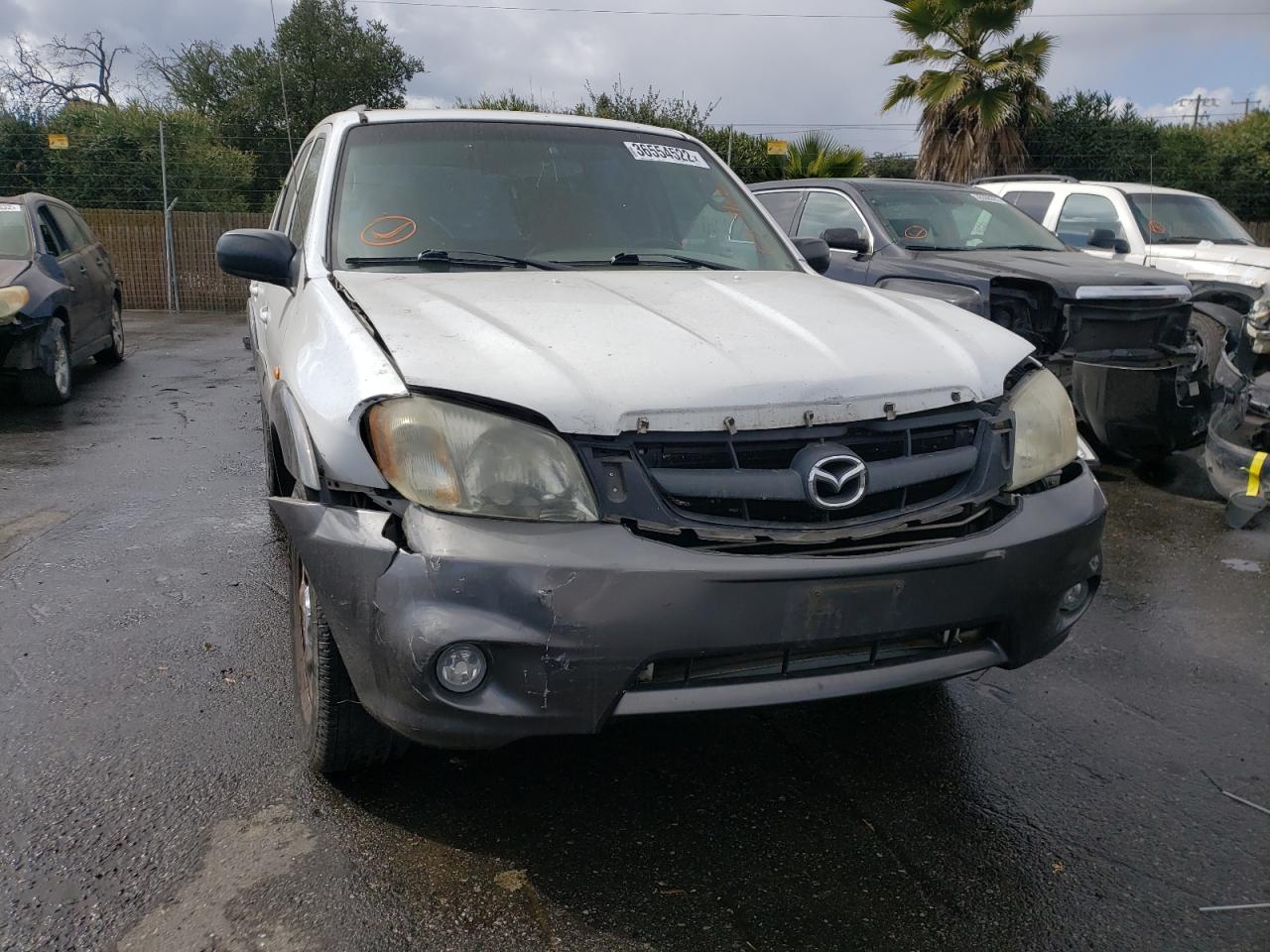 Photo 9 from auction – 2001 MAZDA TRIBUTE DX with VIN 4F2UU07B51KM19089