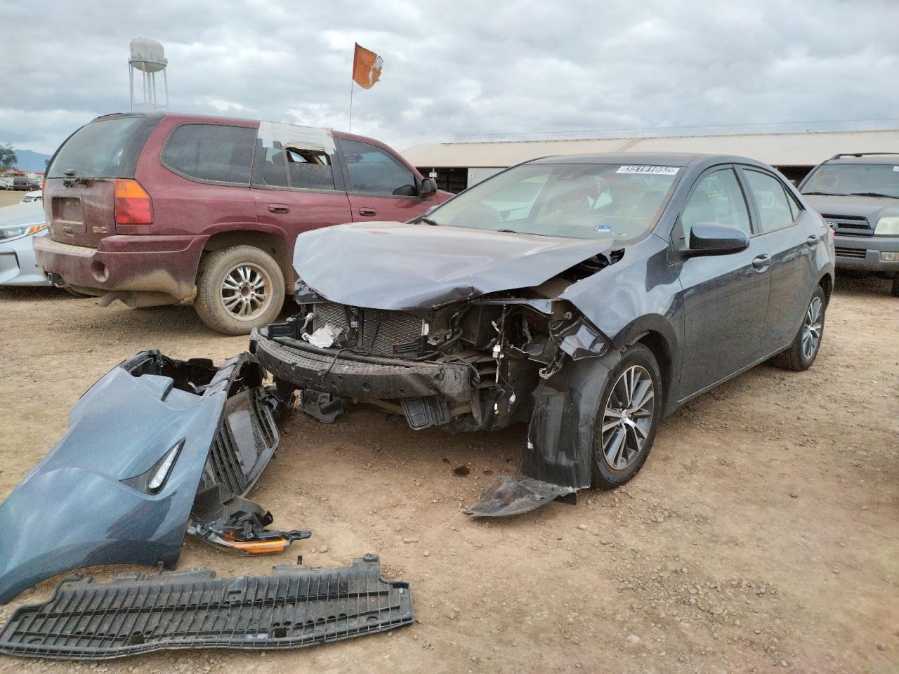 Photo 2 from auction – 2017 TOYOTA COROLLA L with VIN 5YFBURHE5HP587296