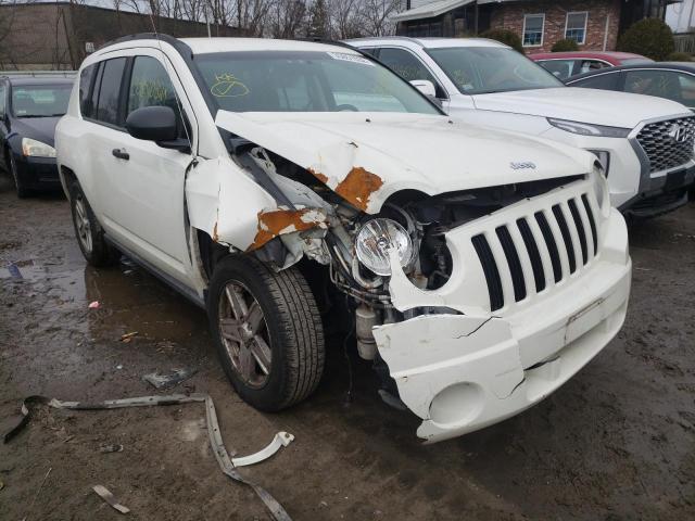 JEEP COMPASS 2007 with VIN 1J8FT47WX7D143214 - Photo from auction