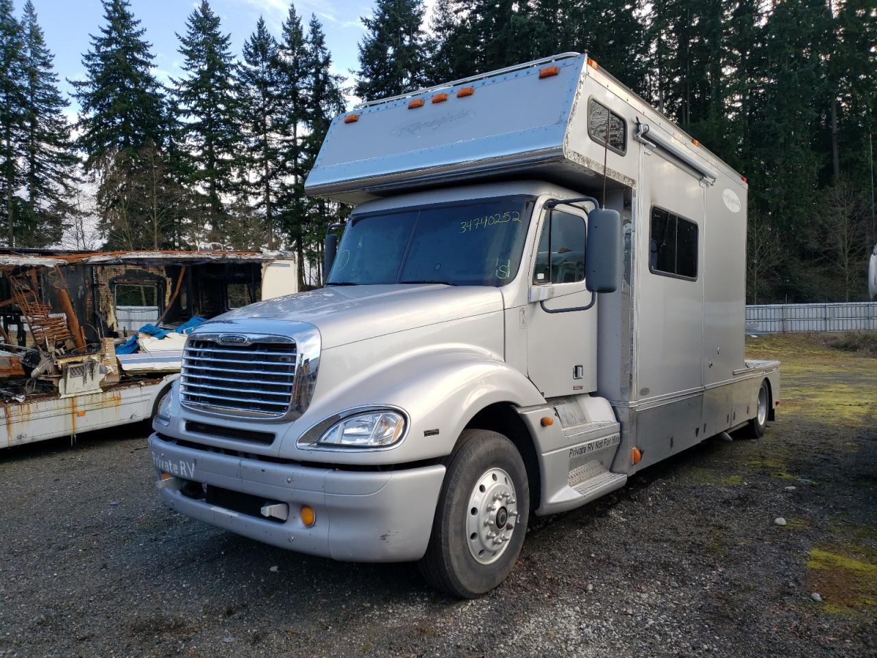 Photo 2 from auction – 2005 FREIGHTLINER CONVENTION with VIN 1FVAA6CVX5LN39280