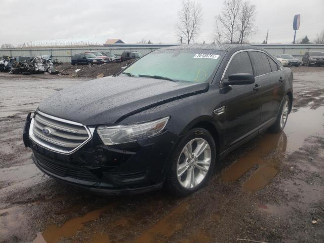 Photo 2 from auction – 2014 FORD TAURUS SEL with VIN 1FAHP2E88EG100280