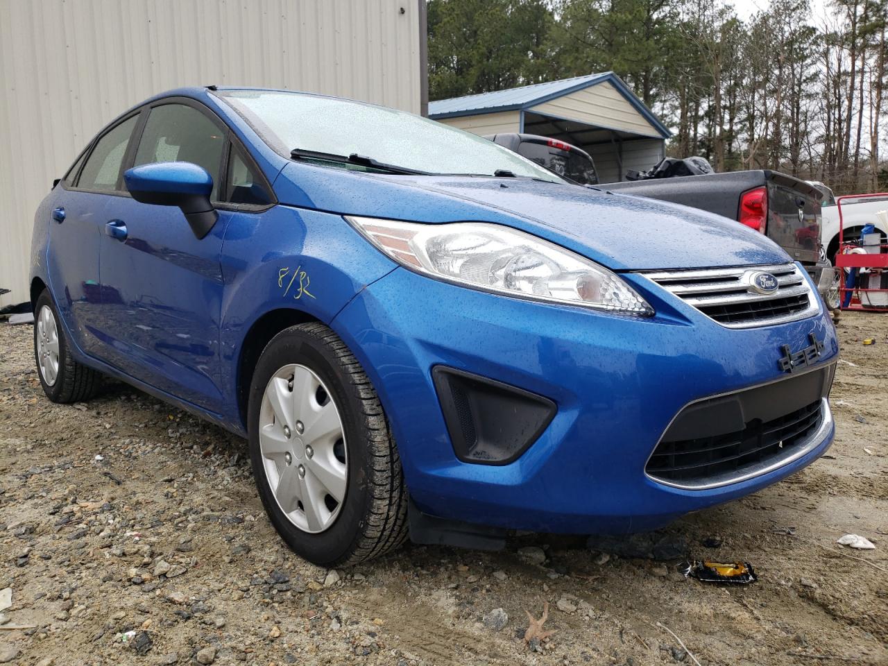 FORD FIESTA SE 2011 with VIN 3FADP4BJ2BM142222 - Photo from auction