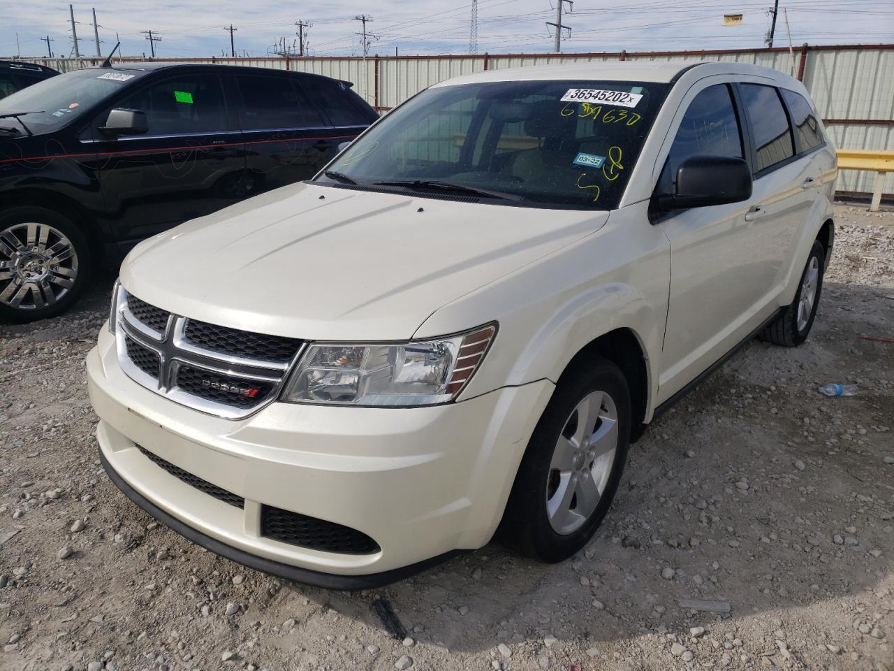 Photo 2 from auction – 2013 DODGE JOURNEY SE with VIN 3C4PDCAB9DT659630