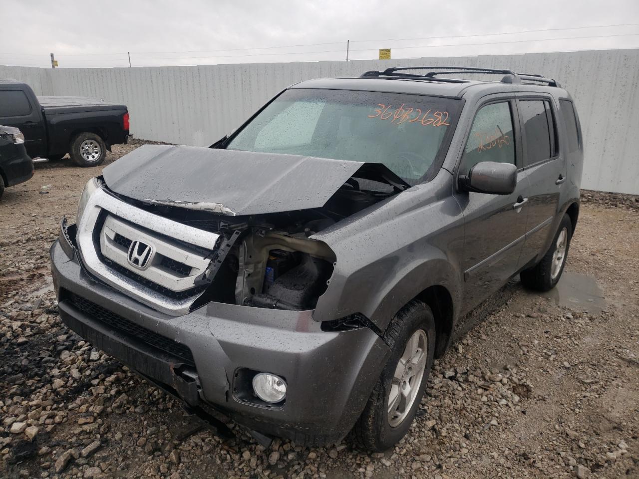 Photo 2 from auction – 2010 HONDA PILOT EXL with VIN 5FNYF4H52AB034937