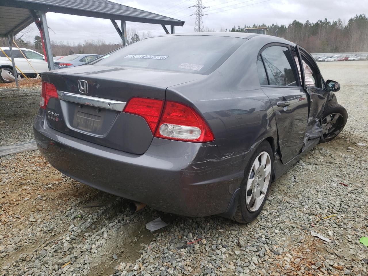 Photo 4 from auction – 2011 HONDA CIVIC LX with VIN 19XFA1F54BE034839