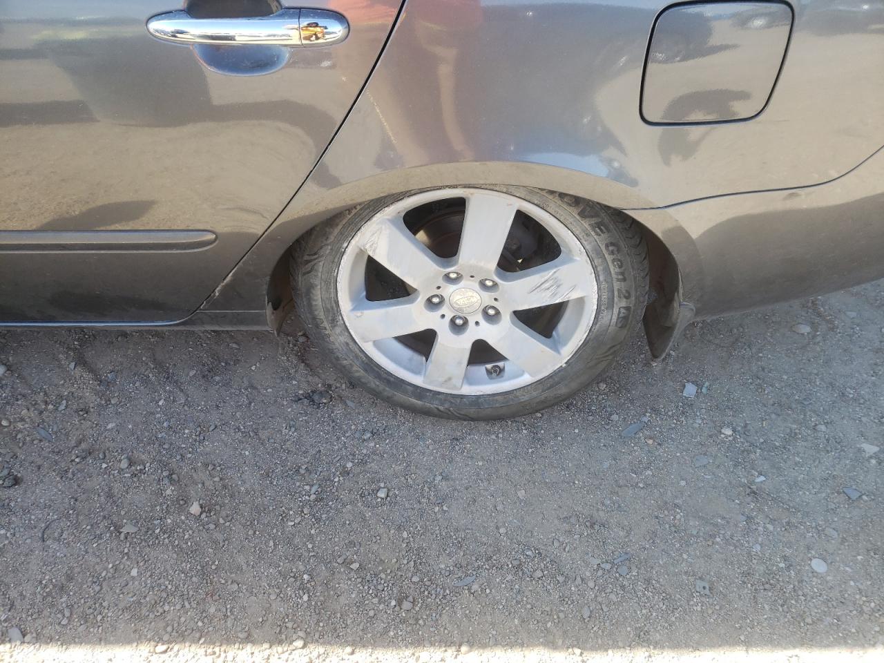 Photo 9 from auction – 2006 KIA OPTIMA LX with VIN KNAGE124465045585