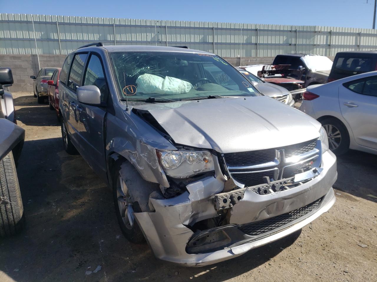 DODGE GRAND CARA 2016 with VIN 2C4RDGBG6GR262524 - Photo from auction