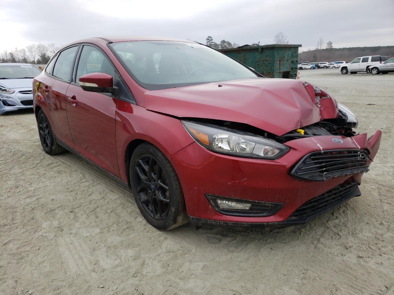 FORD FOCUS SE 2016 with VIN 1FADP3FEXGL403869 - Photo from auction