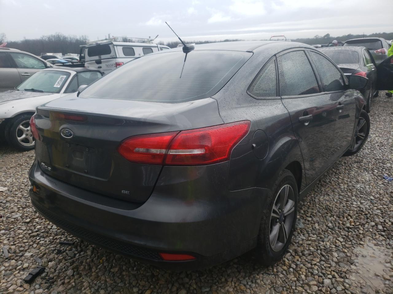 Photo 4 from auction – 2018 FORD FOCUS SE with VIN 1FADP3F26JL308075