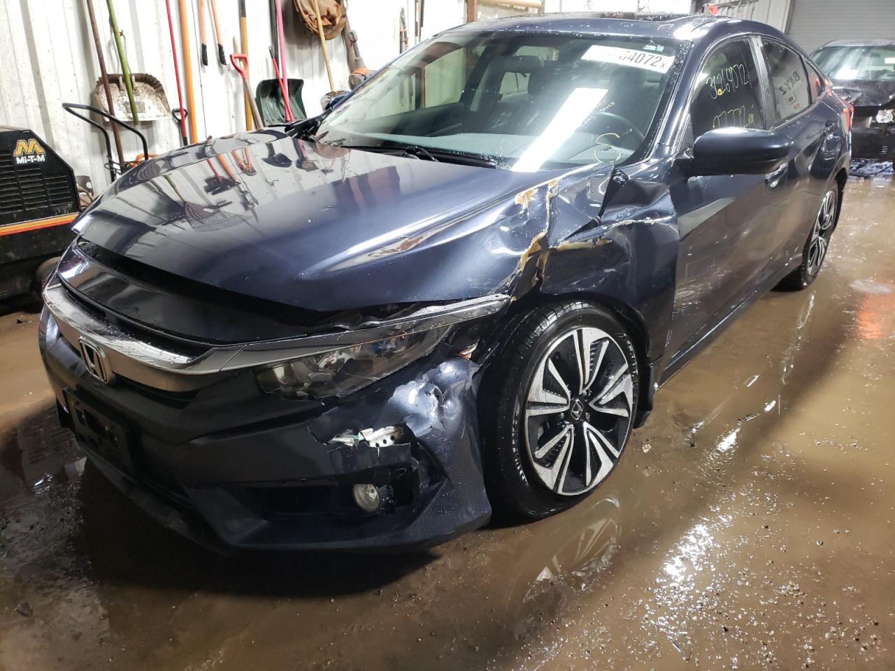 Photo 2 from auction – 2018 HONDA CIVIC EX with VIN JHMFC1F35JX023838