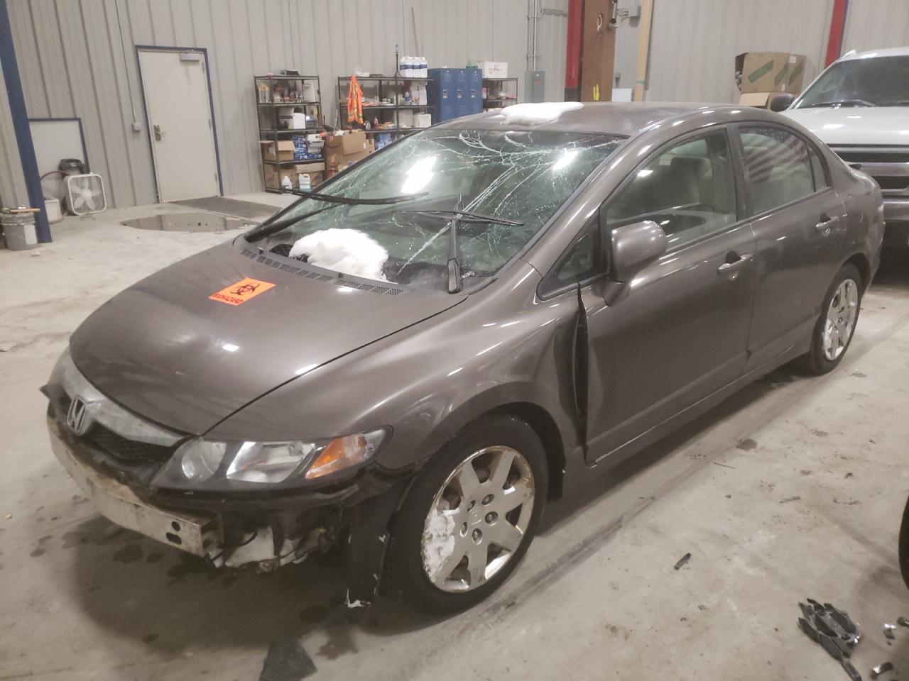 Photo 2 from auction – 2011 HONDA CIVIC LX with VIN 19XFA1F54BE048692