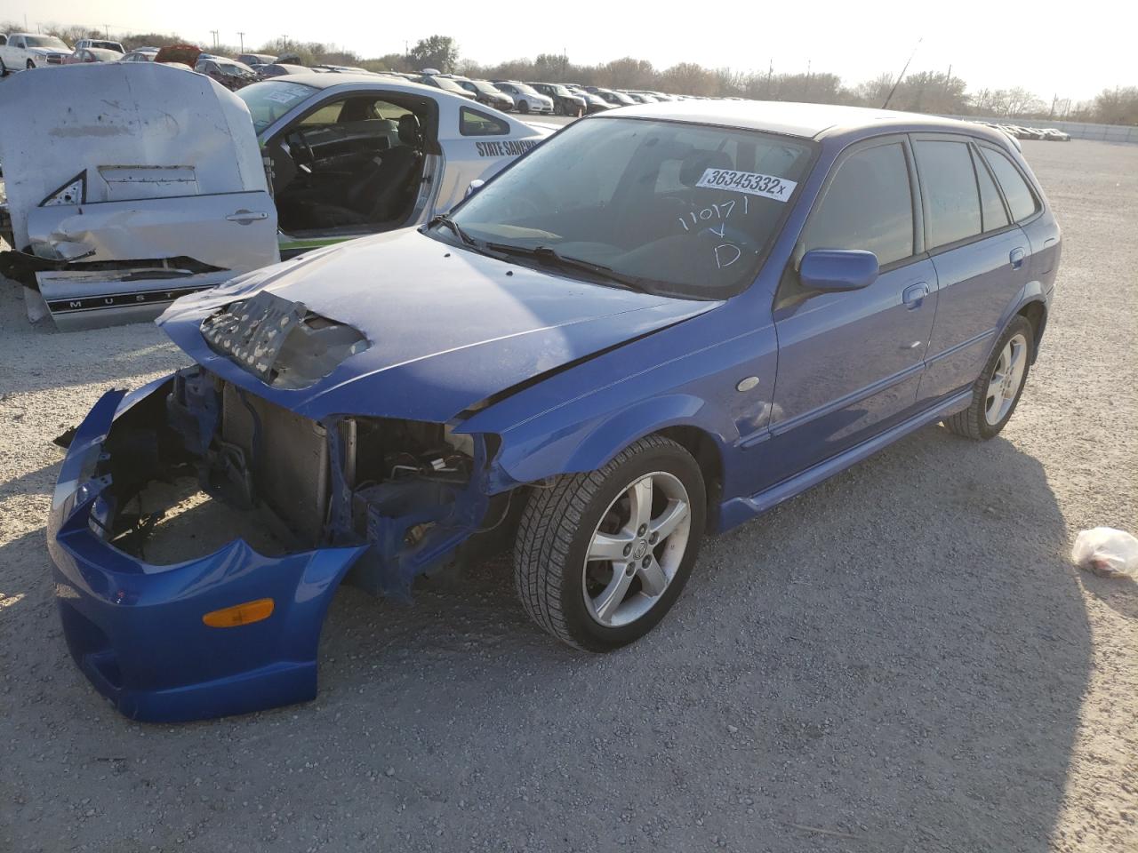 Photo 2 from auction – 2003 MAZDA PROTEGE PR with VIN JM1BJ245531184437