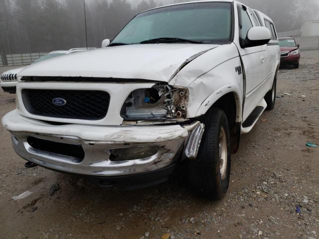 Photo 9 from auction – 1998 FORD F150 with VIN 1FTRX18L1WNA54538