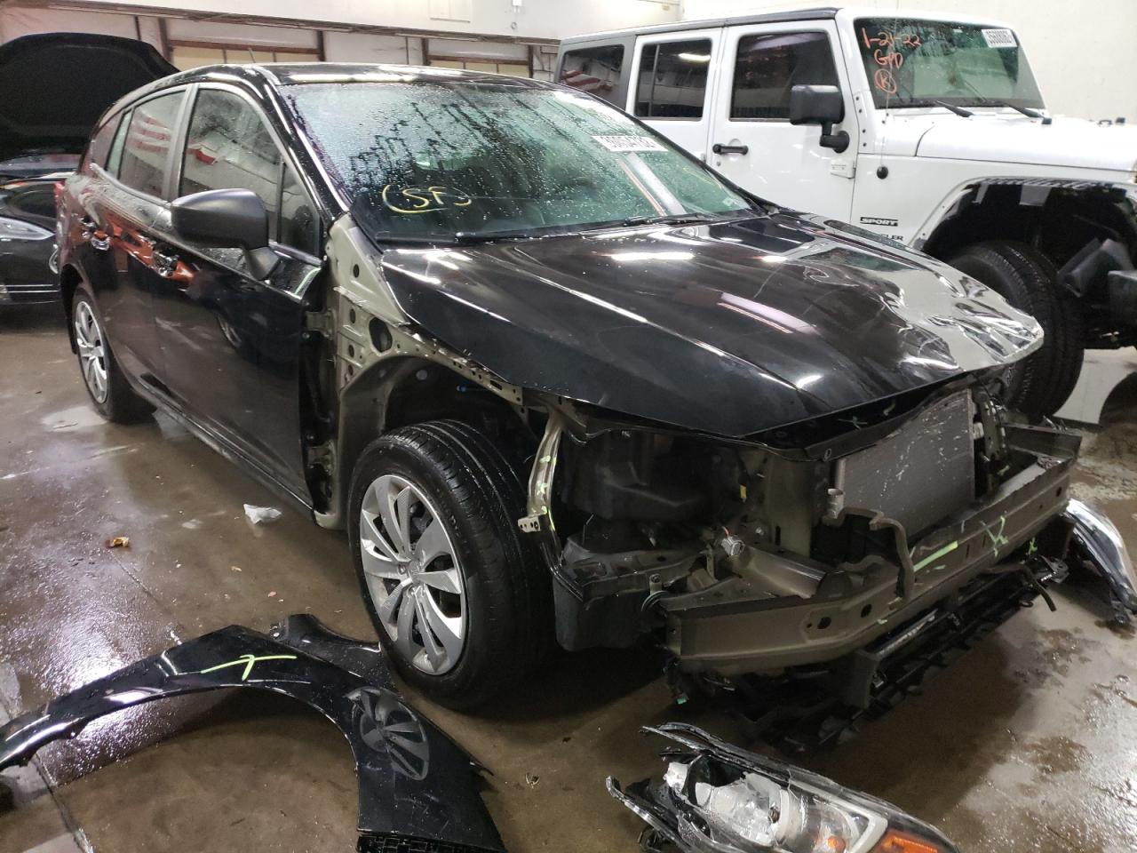 SUBARU IMPREZA 2018 with VIN 4S3GTAA6XJ3717861 - Photo from auction