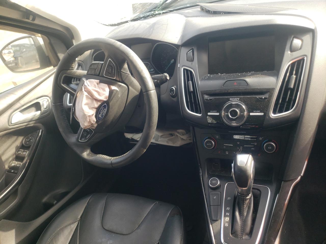 Photo 9 from auction – 2017 FORD FOCUS TITA with VIN 1FADP3N24HL349039