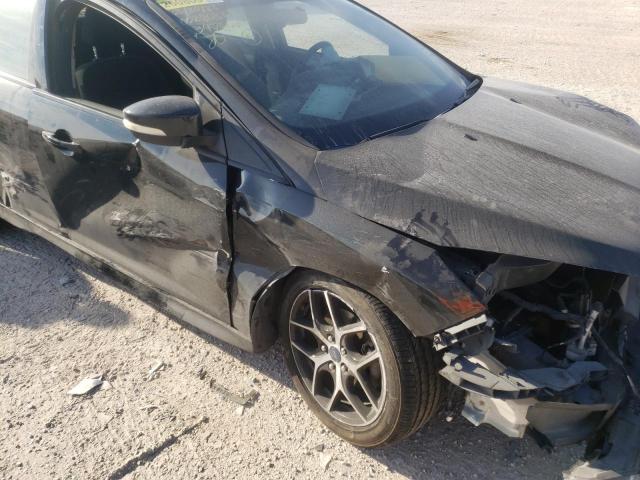 Photo 10 from auction – 2015 FORD FOCUS SE with VIN 1FADP3F24FL347660