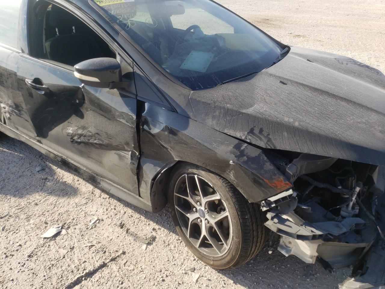 Photo 20 from auction – 2015 FORD FOCUS SE with VIN 1FADP3F24FL347660