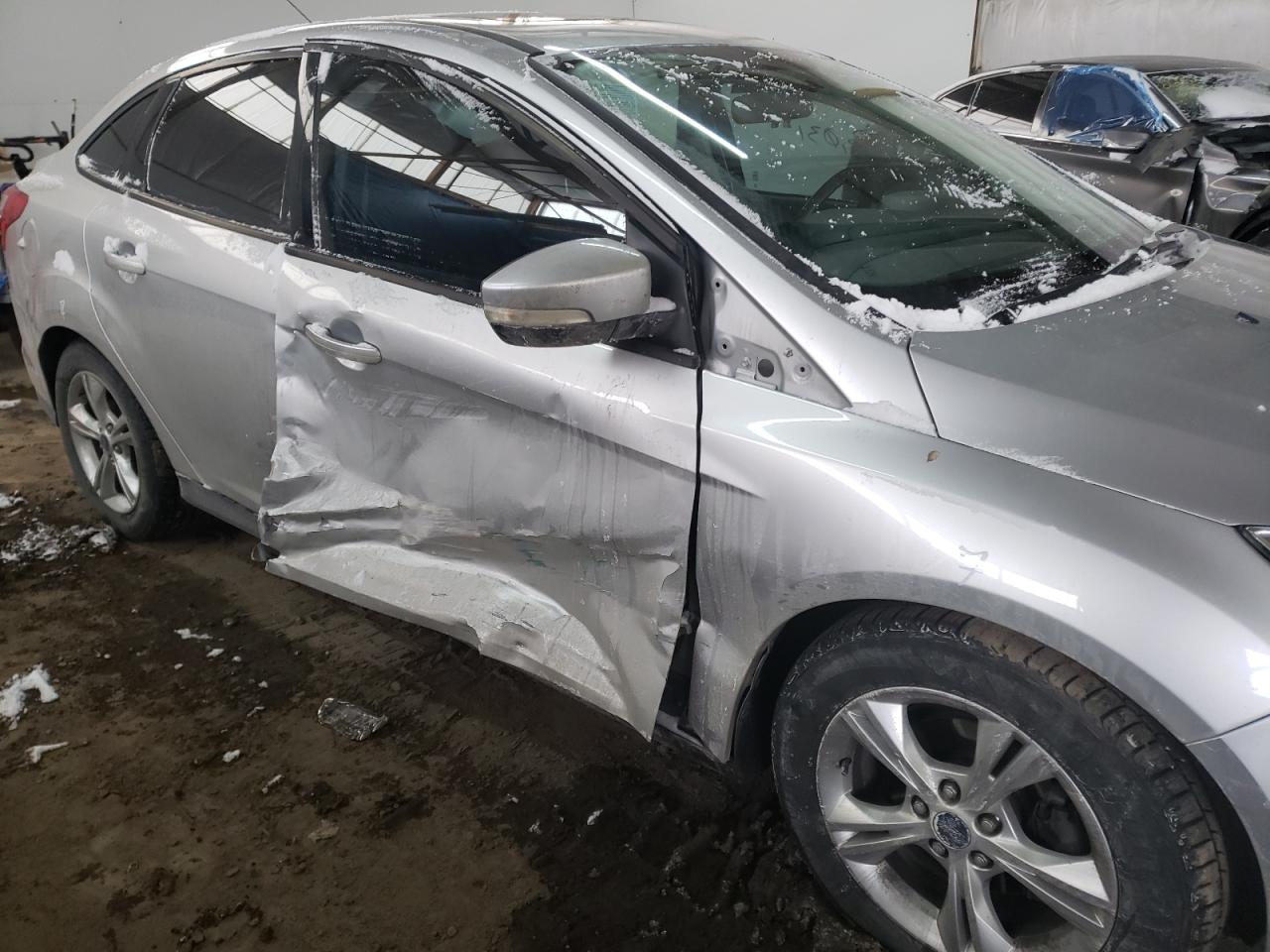 Photo 9 from auction – 2014 FORD FOCUS SE with VIN 1FADP3F2XEL277063