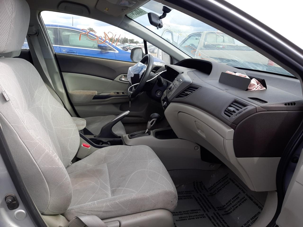Photo 5 from auction – 2012 HONDA CIVIC LX with VIN JHMFB2F58CS004985