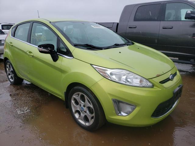 FORD FIESTA SES 2011 with VIN 3FADP4FJ8BM105847 - Photo from auction