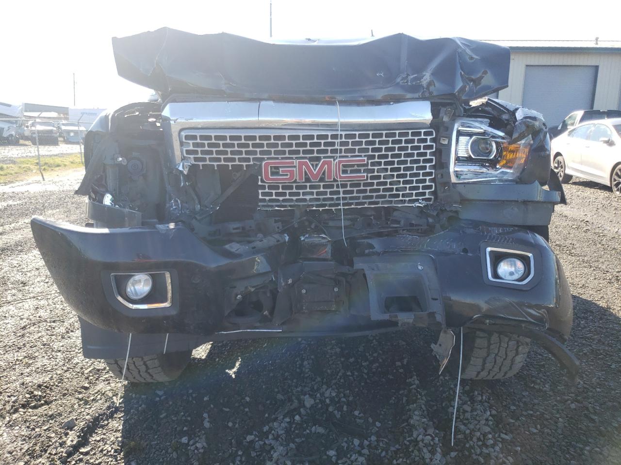 Photo 9 from auction – 2016 GMC SIERRA K35 with VIN 1GT42YE84GF266704