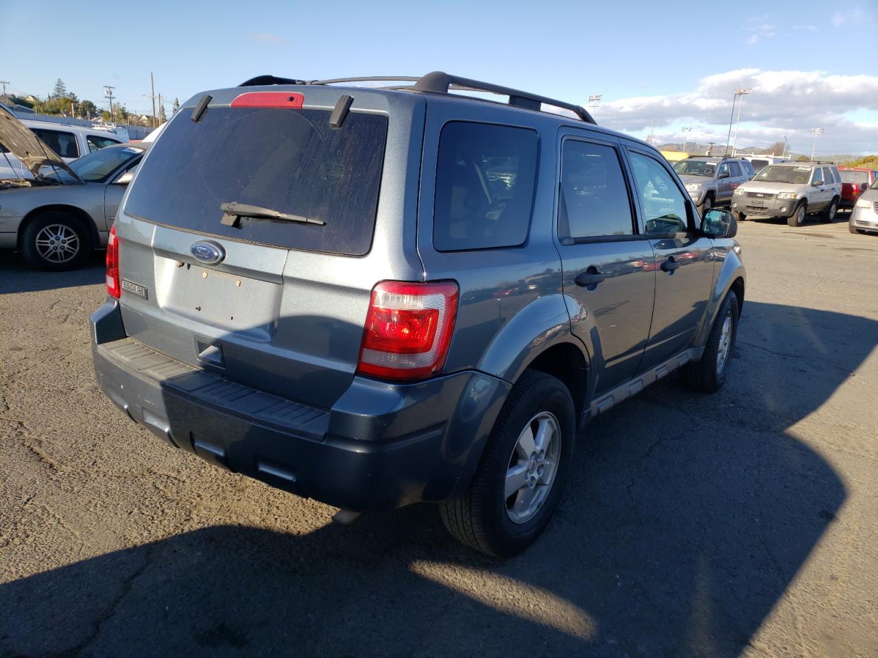 Photo 4 from auction – 2010 FORD ESCAPE with VIN 1FMCU9D79AKC96814