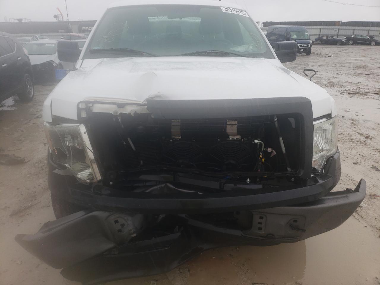 Photo 9 from auction – 2014 FORD F150 with VIN 1FTMF1CF8EKG07992