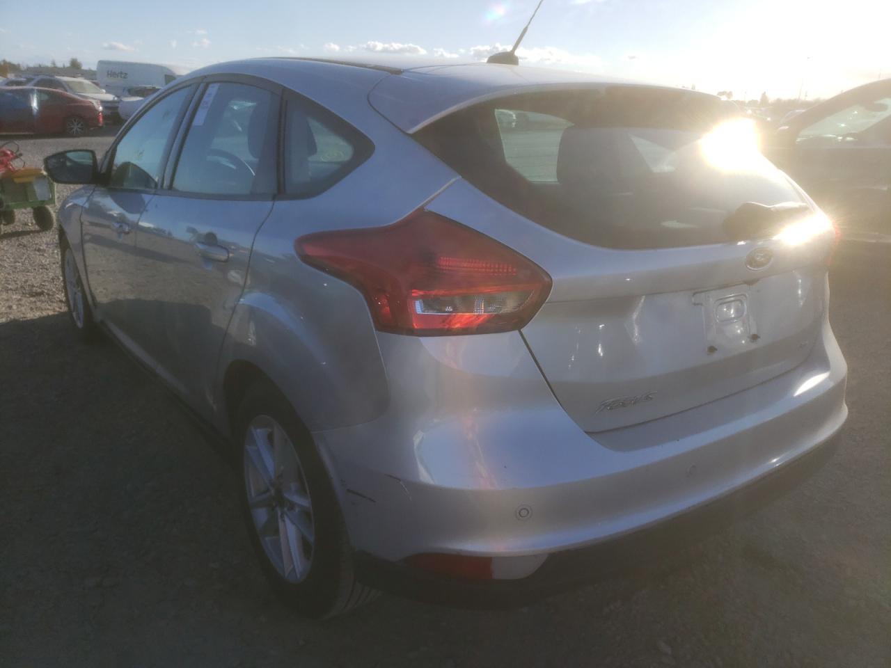 Photo 3 from auction – 2015 FORD  with VIN 1FADP3K22FL364575