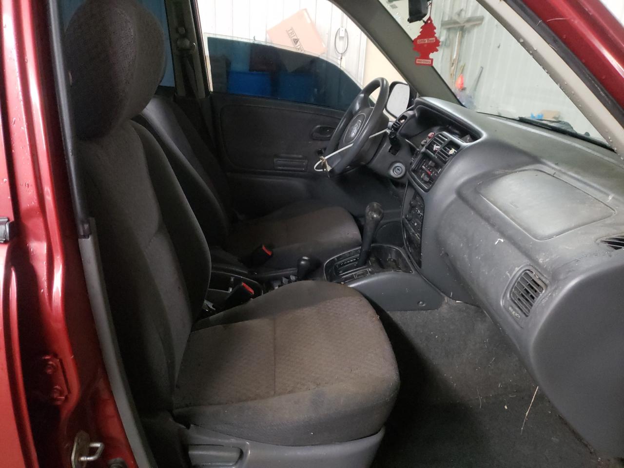 Photo 5 from auction – 2000 CHEVROLET TRACKER with VIN 2CNBJ13C7Y6957662