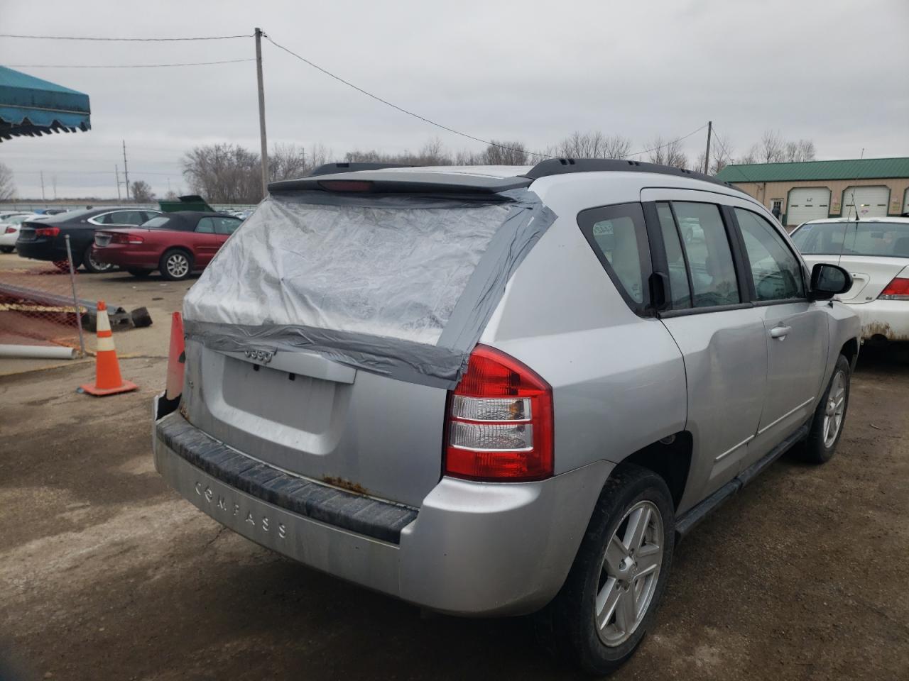 Photo 4 from auction – 2010 JEEP COMPASS SP with VIN 1J4NF4FB1AD631428