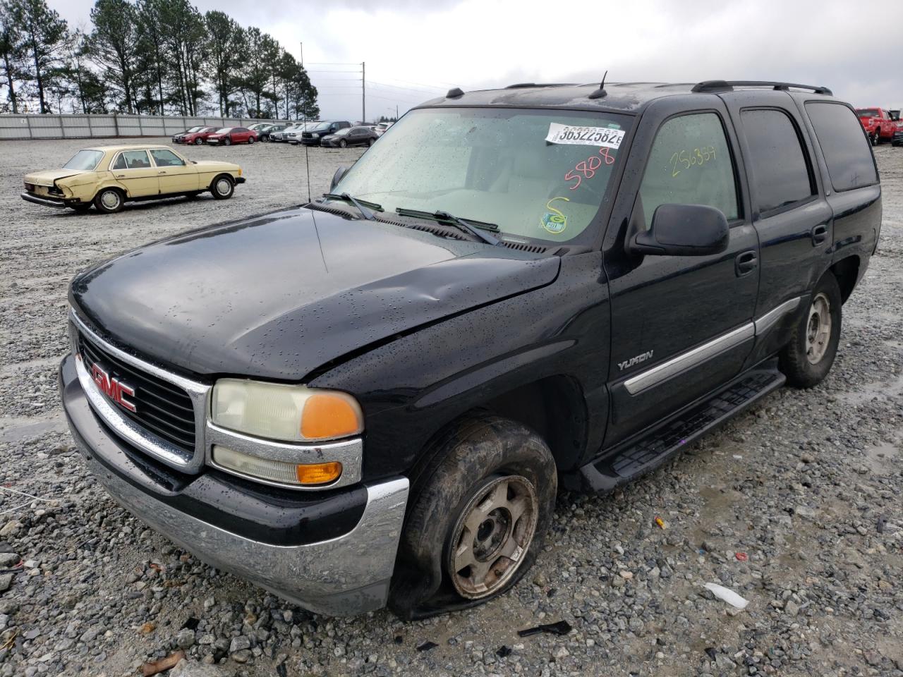 Photo 2 from auction – 2004 GMC YUKON with VIN 1GKEC13Z44J275808