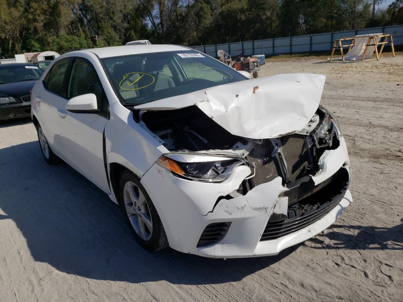 TOYOTA COROLLA L 2015 with VIN 5YFBURHE7FP272657 - Photo from auction