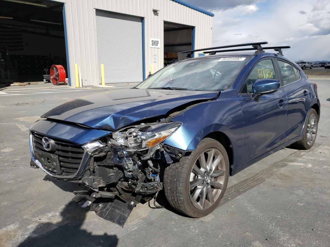 Photo 2 from auction – 2018 MAZDA 3 TOURING with VIN 3MZBN1L34JM165793