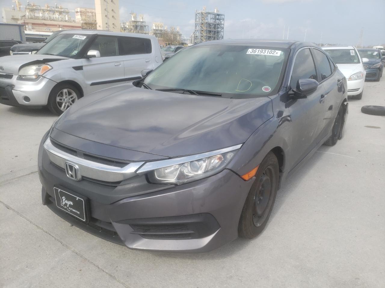 Photo 2 from auction – 2017 HONDA CIVIC LX with VIN 2HGFC2F55HH502060