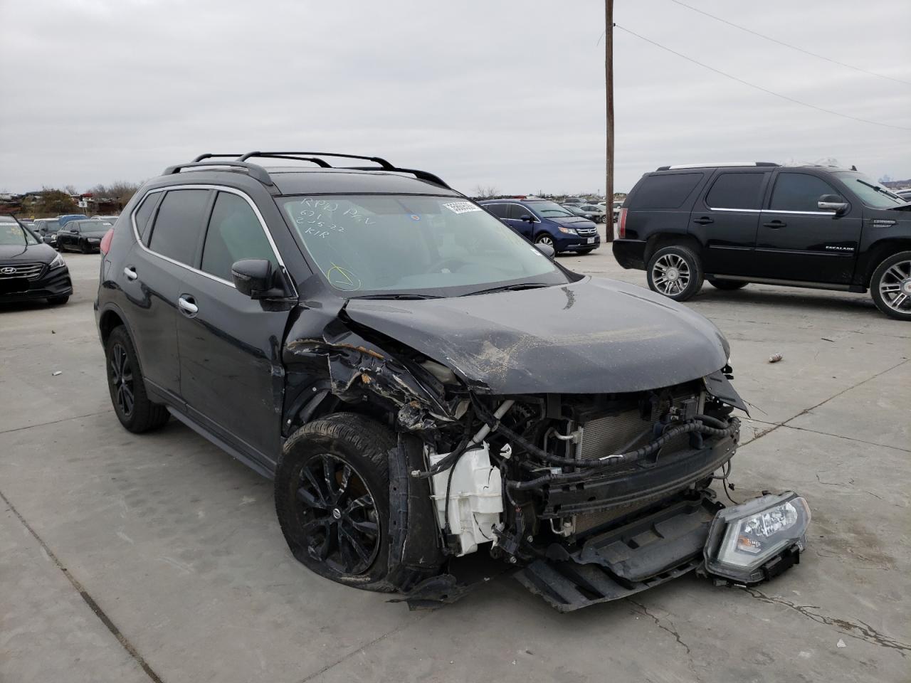 NISSAN ROGUE S 2017 with VIN 5N1AT2MTXHC879203 - Photo from auction