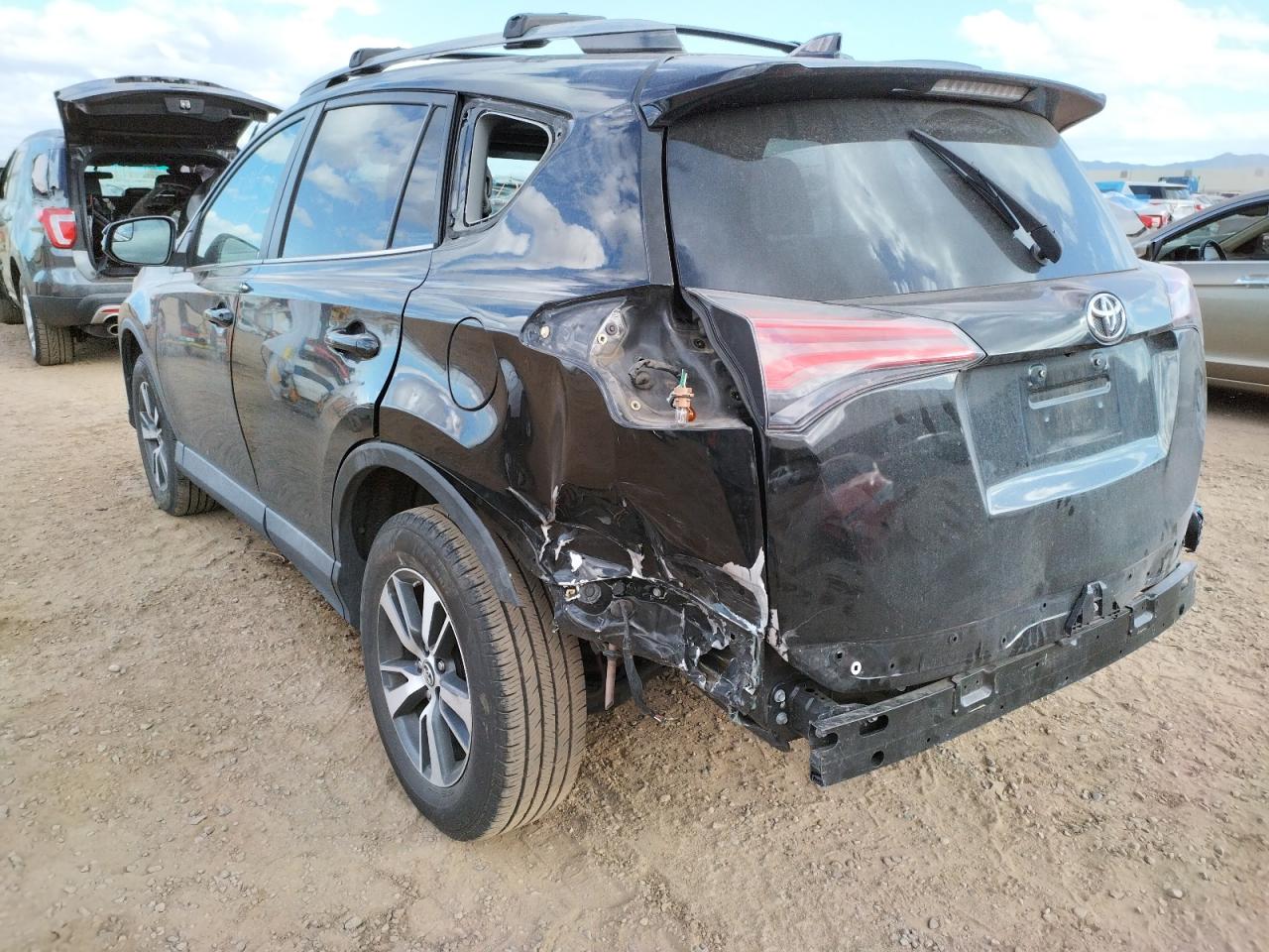 Photo 3 from auction – 2017 TOYOTA RAV4 XLE with VIN 2T3WFREV1HW330156