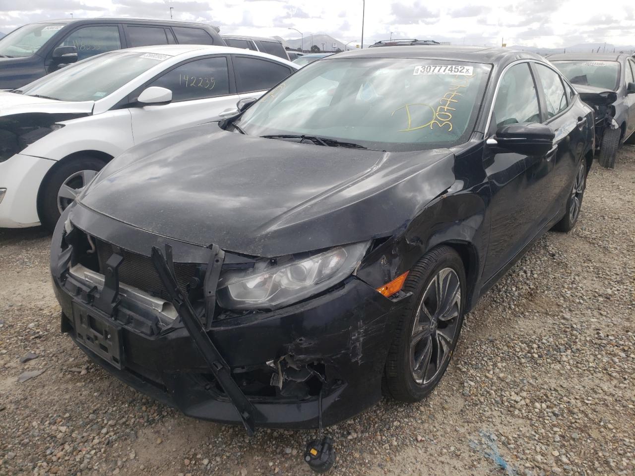Photo 2 from auction – 2016 HONDA CIVIC EXL with VIN 2HGFC1F73GH639637