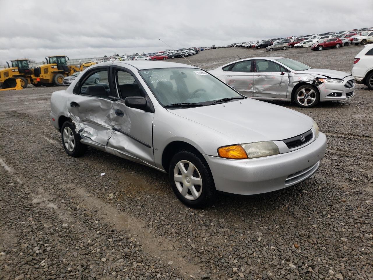 MAZDA PROTEGE DX 1998 with VIN JM1BC1418W0191782 - Photo from auction