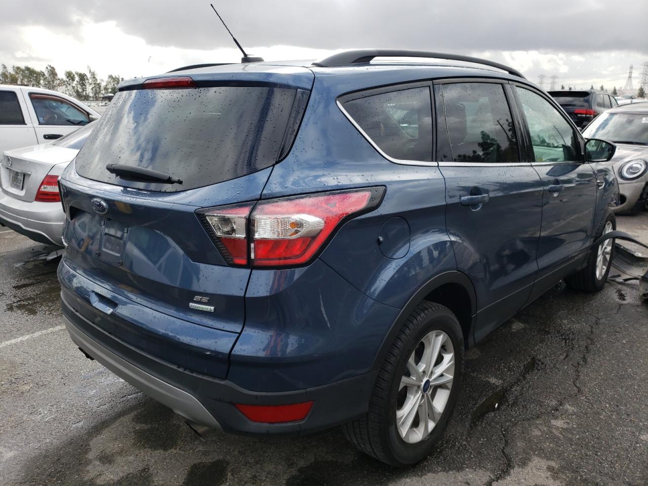Photo 4 from auction – 2018 FORD ESCAPE SE with VIN 1FMCU0GD8JUA85945
